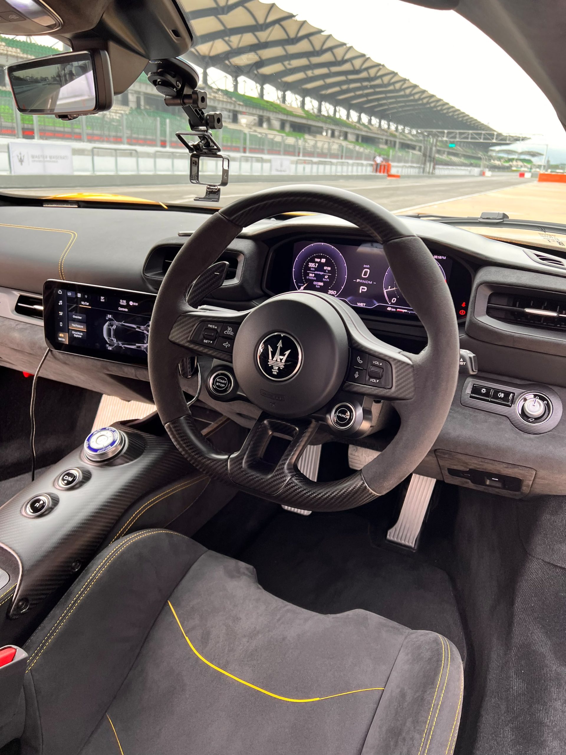 There’s a lone touchscreen popping out of an alcantara-bathed dashboard. A carbon-fibre covered central tunnel gives you a dial and two-buttons. No frills (Image Source: Parth Charan/Moneycontrol)